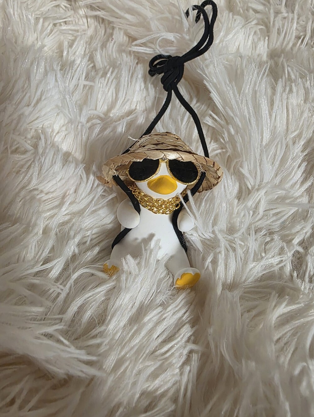Cute White Swinging Goose with Straw Hat and Sunglasses